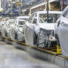 An Image Showing The Production Line In Auto Manufacturing Industry.